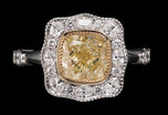 A Natural Fancy Light Yellow Diamond Cluster Ring