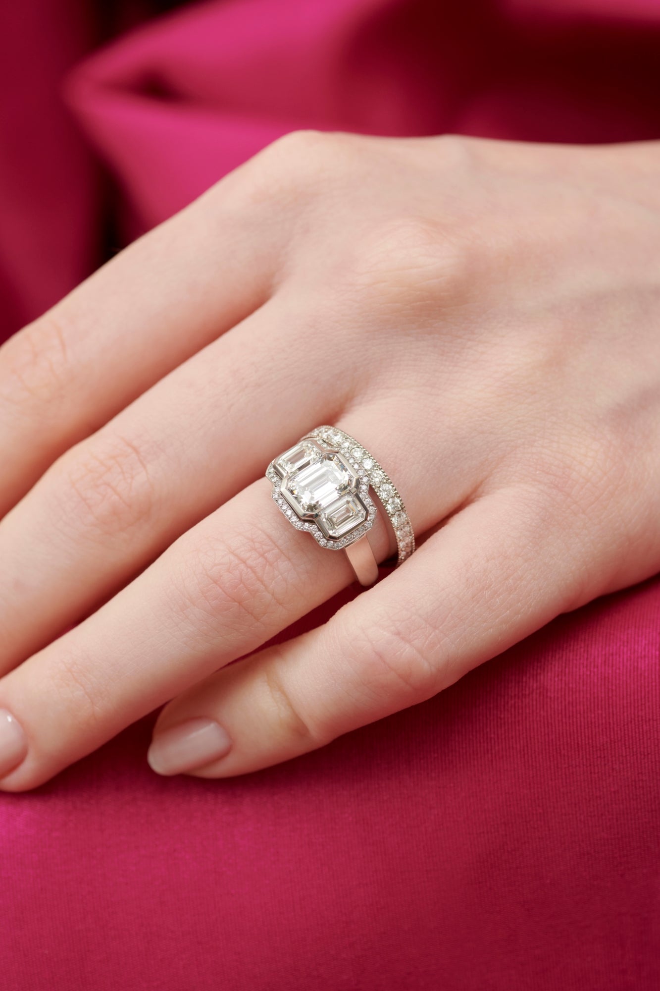A Unique & Very Special Emerald Cut Diamond Three Stone Cluster Ring