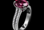 A Very Beautiful Ruby Single Stone Ring with Twin Diamond Set Rail Shoulders