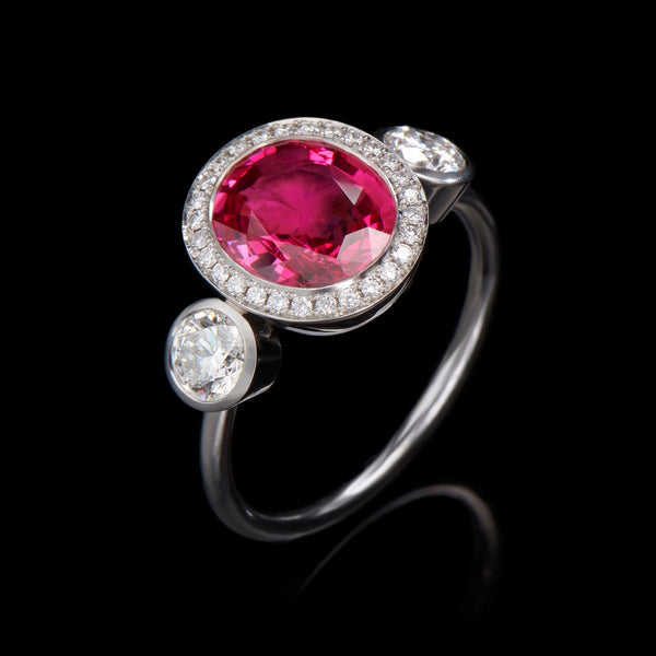 An exceptional pink spinel & diamond cluster ring