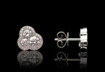 A pair of diamond trefoil cluster earrings