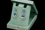 An exclusive pair of aquamarine and diamond drop earrings
