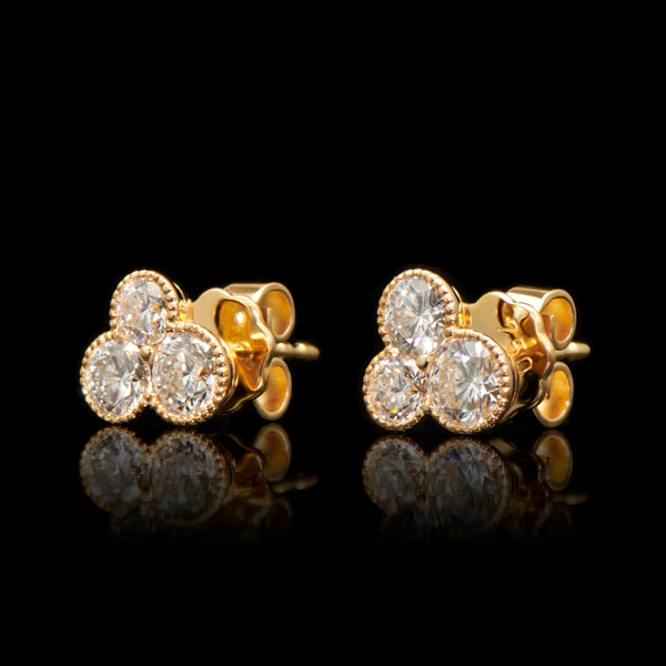 18 carat yellow gold and diamond trefoil stud earrings