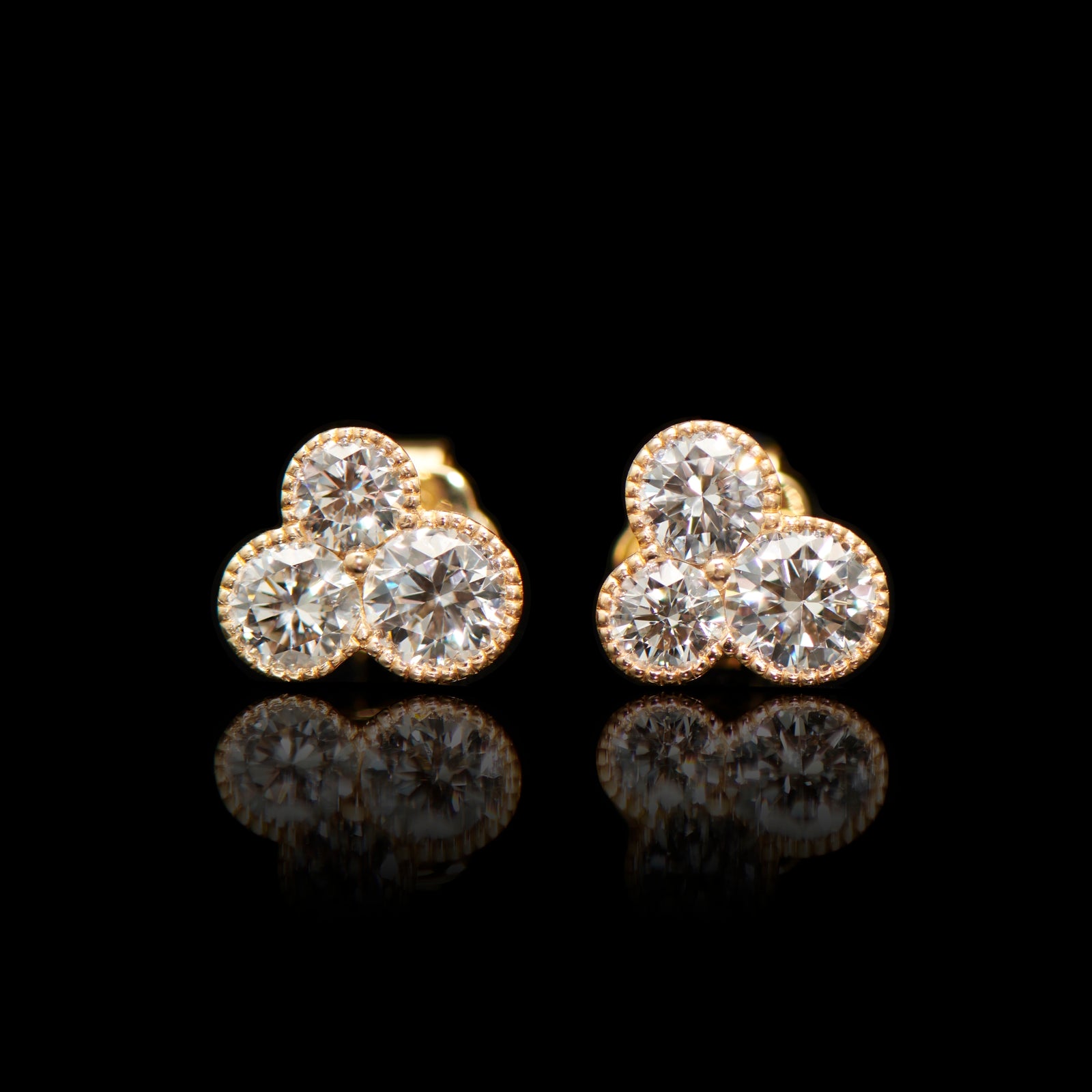 18 carat yellow gold and diamond trefoil stud earrings
