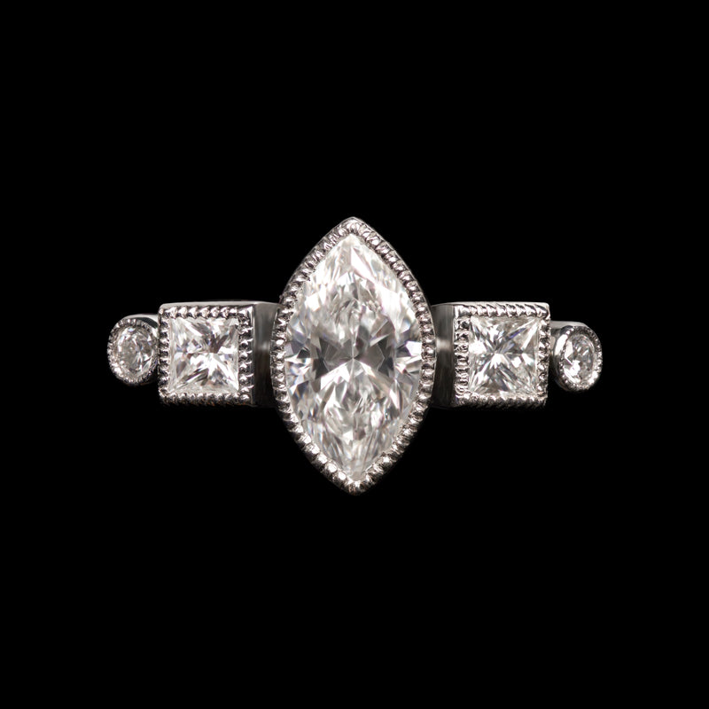 A navette, carree & brilliant cut diamond ring