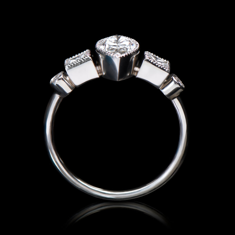 A navette, carree & brilliant cut diamond ring