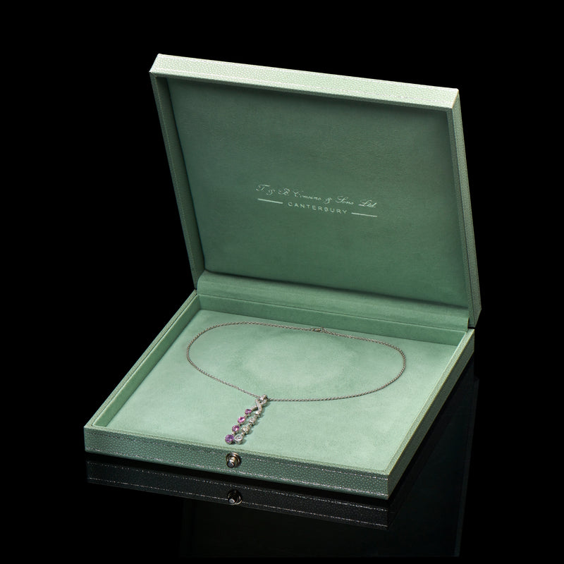 A twin cascade pink sapphire & diamond pendant