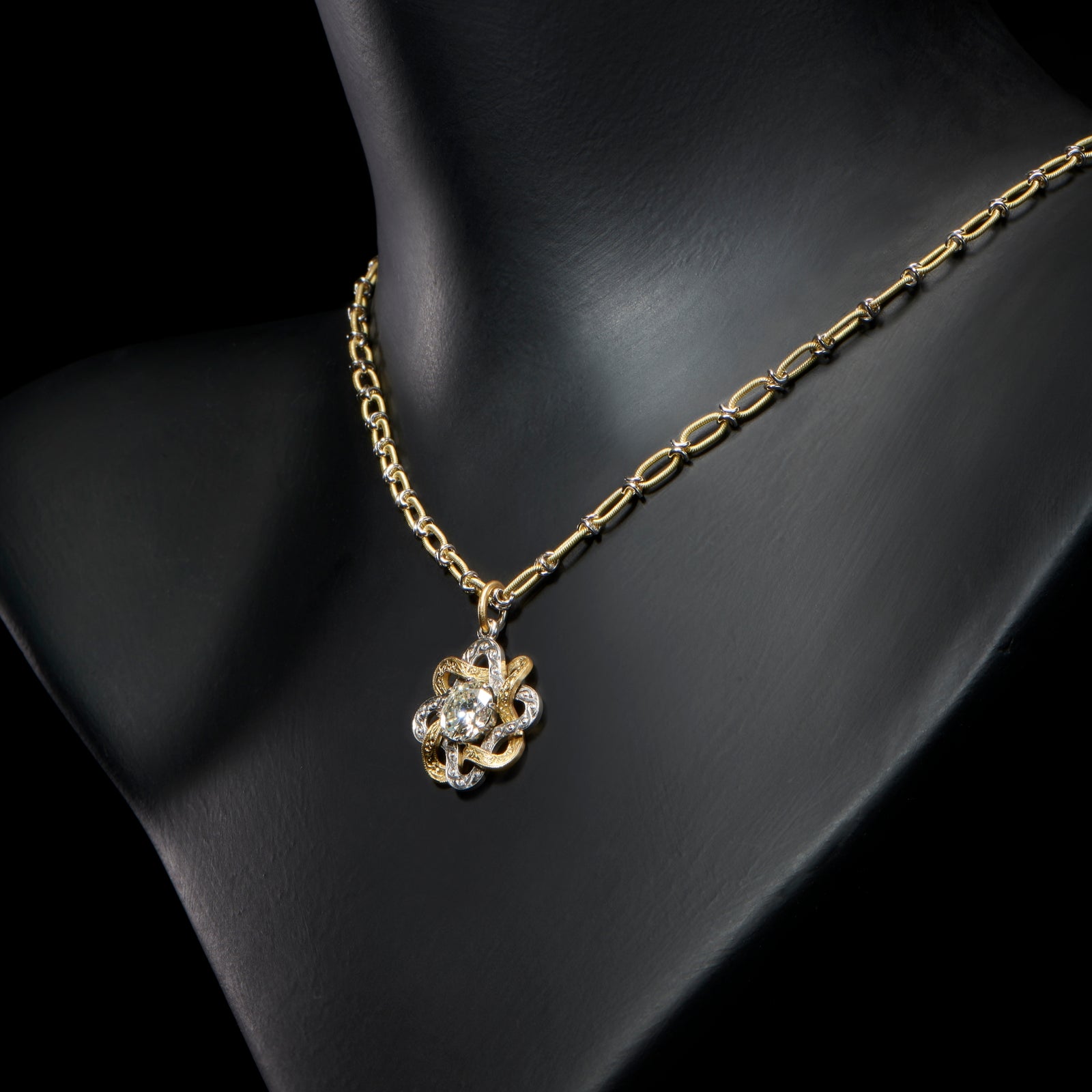 A unique diamond single stone pendant
