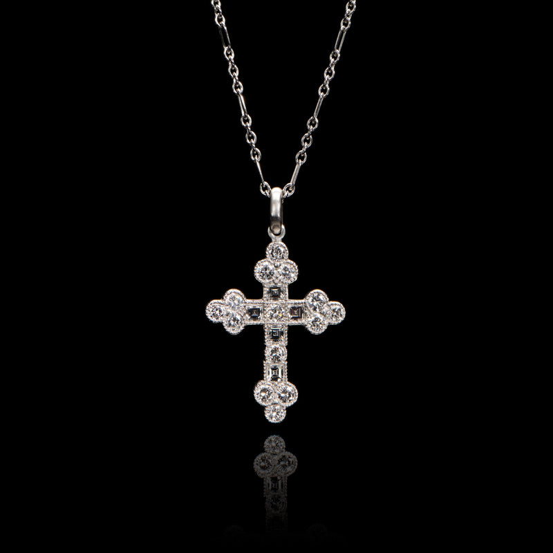 A brilliant & carree cut diamond Cousins cross, in all platinum