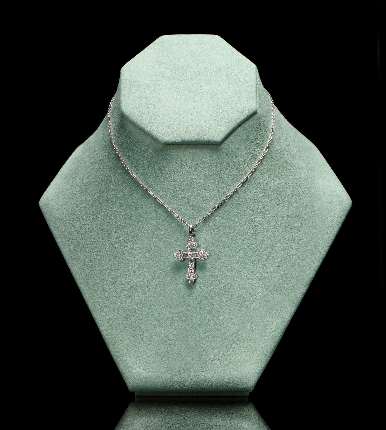A brilliant & carree cut diamond Cousins cross, in all platinum