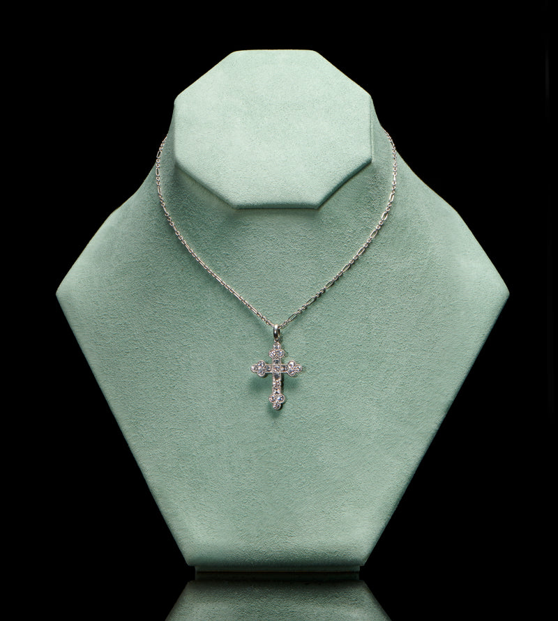 A brilliant & carree cut diamond Cousins cross, in all platinum