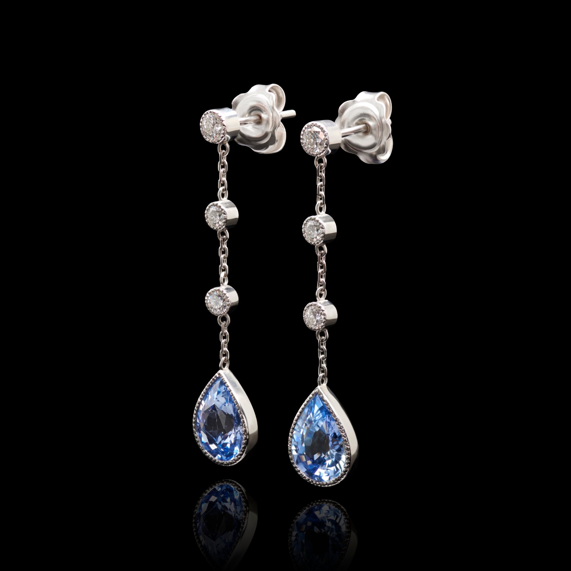 A unique pair of sapphire diamond drop earrings