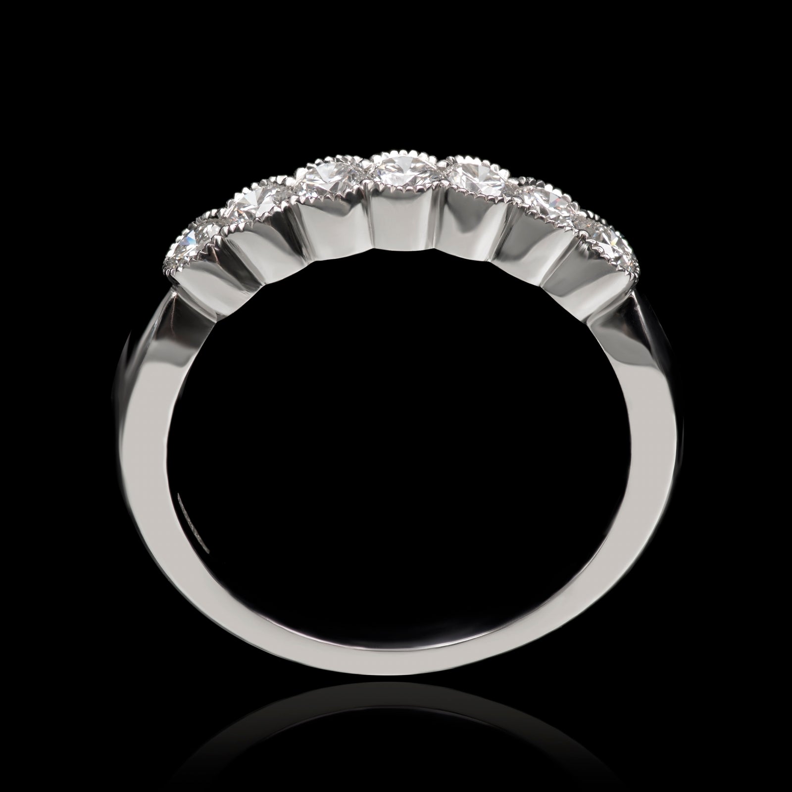 A Classically Elegant Seven Stone Diamond Half Hoop Eternity Ring