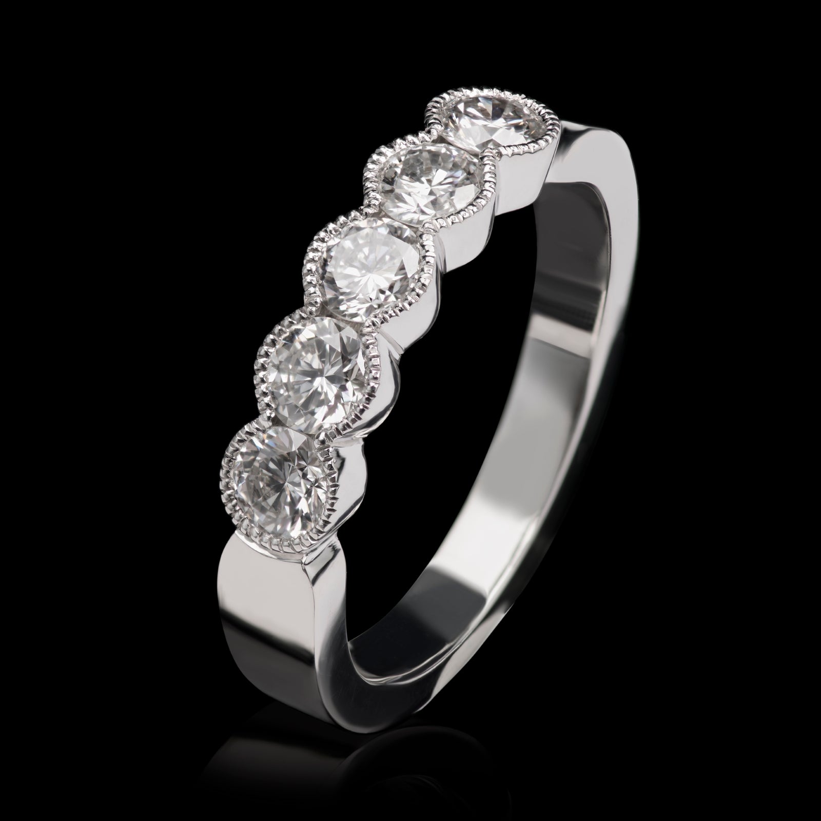 A Diamond Five Stone Half Hoop Half Eternity Ring with Scalloped Edge Settings