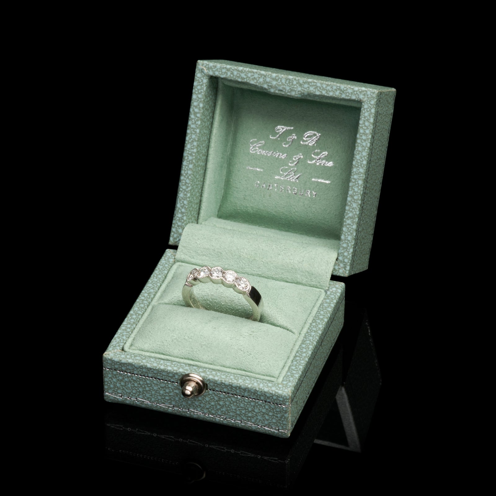 A Diamond Five Stone Half Hoop Half Eternity Ring with Scalloped Edge Settings