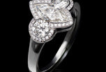 A Marquise & Brilliant cut diamond three stone Cluster Ring