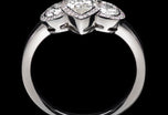 A Marquise & Brilliant cut diamond three stone Cluster Ring
