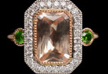 A Unique & Lovely peach Sapphire & Diamond cluster ring with Demantoid Garnet Shoulders