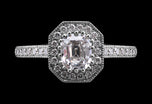 A Fine Quality Emerald Cut Diamond Cluster Ring