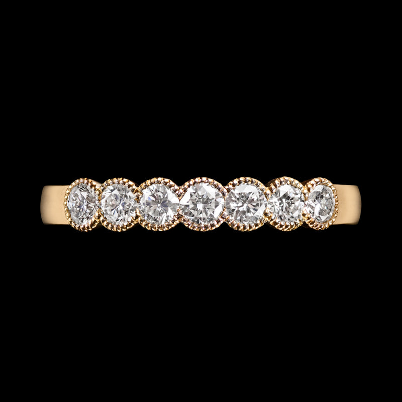A Classically Elegant Seven Stone Diamond Half Hoop Eternity Ring