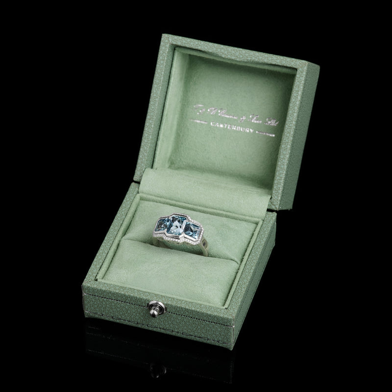 A Three Stone Aquamarine & Diamond Cluster Ring