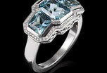 A Three Stone Aquamarine & Diamond Cluster Ring