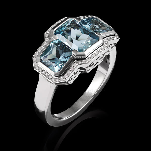 A Three Stone Aquamarine & Diamond Cluster Ring