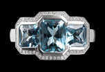A Three Stone Aquamarine & Diamond Cluster Ring