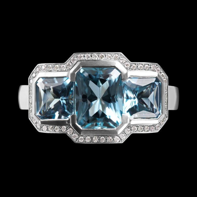 A Three Stone Aquamarine & Diamond Cluster Ring