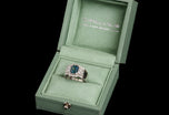 A Unique Teal Sapphire & Princess Cut Diamond Cluster Ring