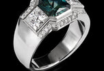 A Unique Teal Sapphire & Princess Cut Diamond Cluster Ring