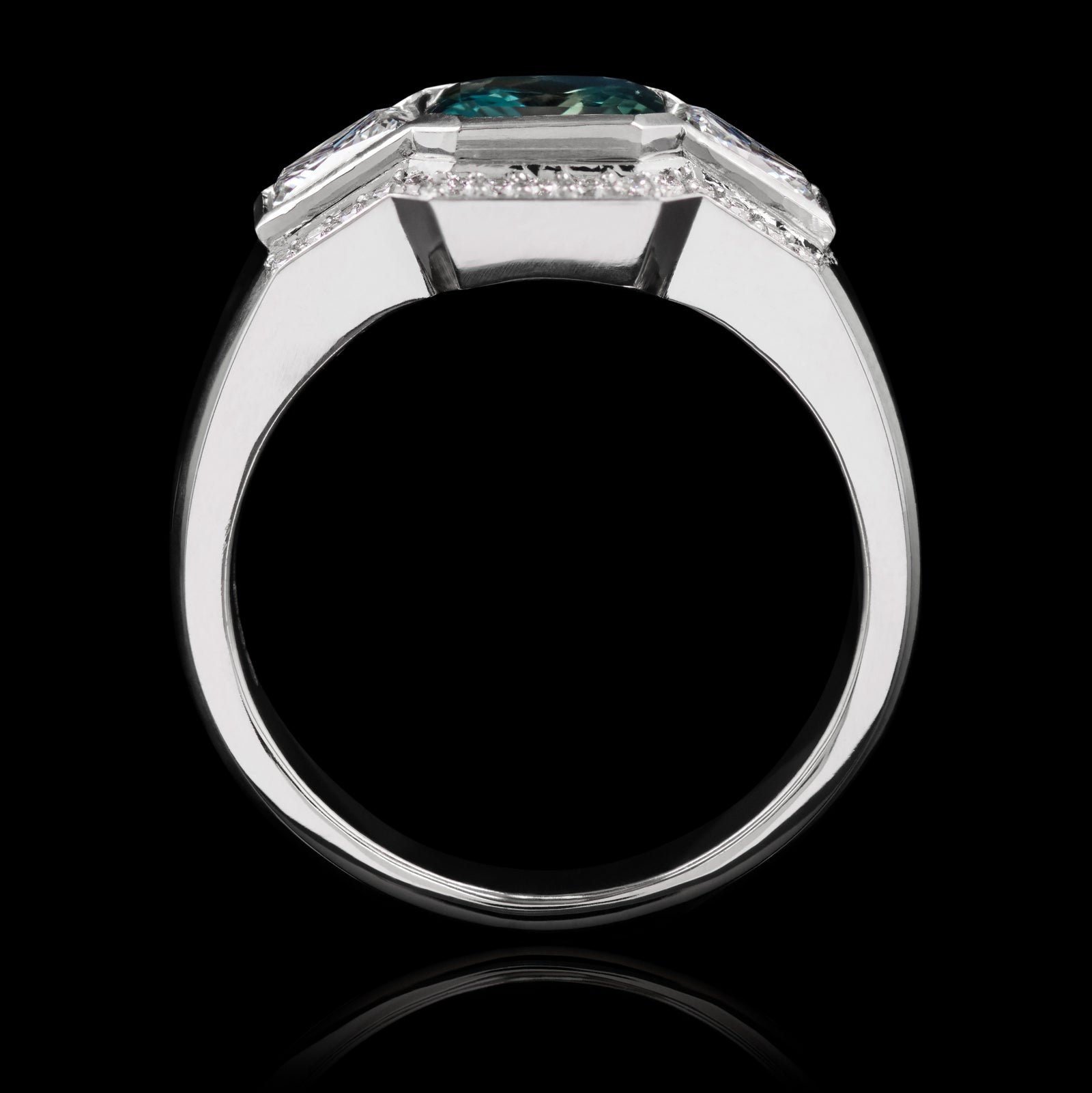 A Unique Teal Sapphire & Princess Cut Diamond Cluster Ring