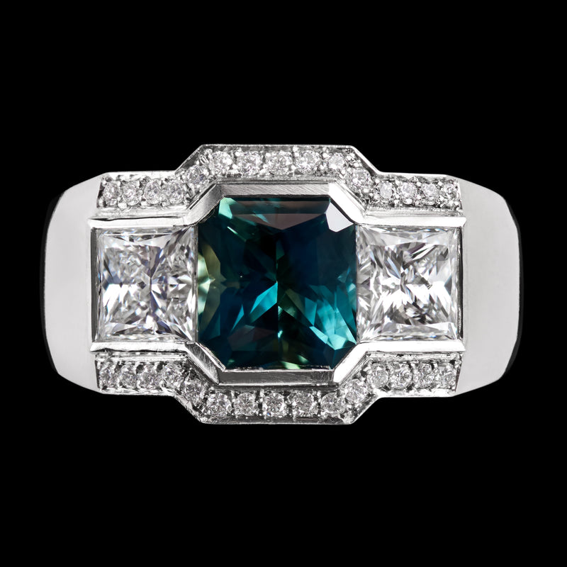 A Unique Teal Sapphire & Princess Cut Diamond Cluster Ring