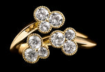 A diamond triple trefoil entwined cluster ring