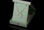 A diamond circlet pendant in Platinum
