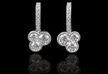 A Pair of Diamond Trefoil Drop Earrings with Diamond Set Hook Fittings