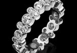 A sparkling 'String of Bubbles' diamond full eternity ring.