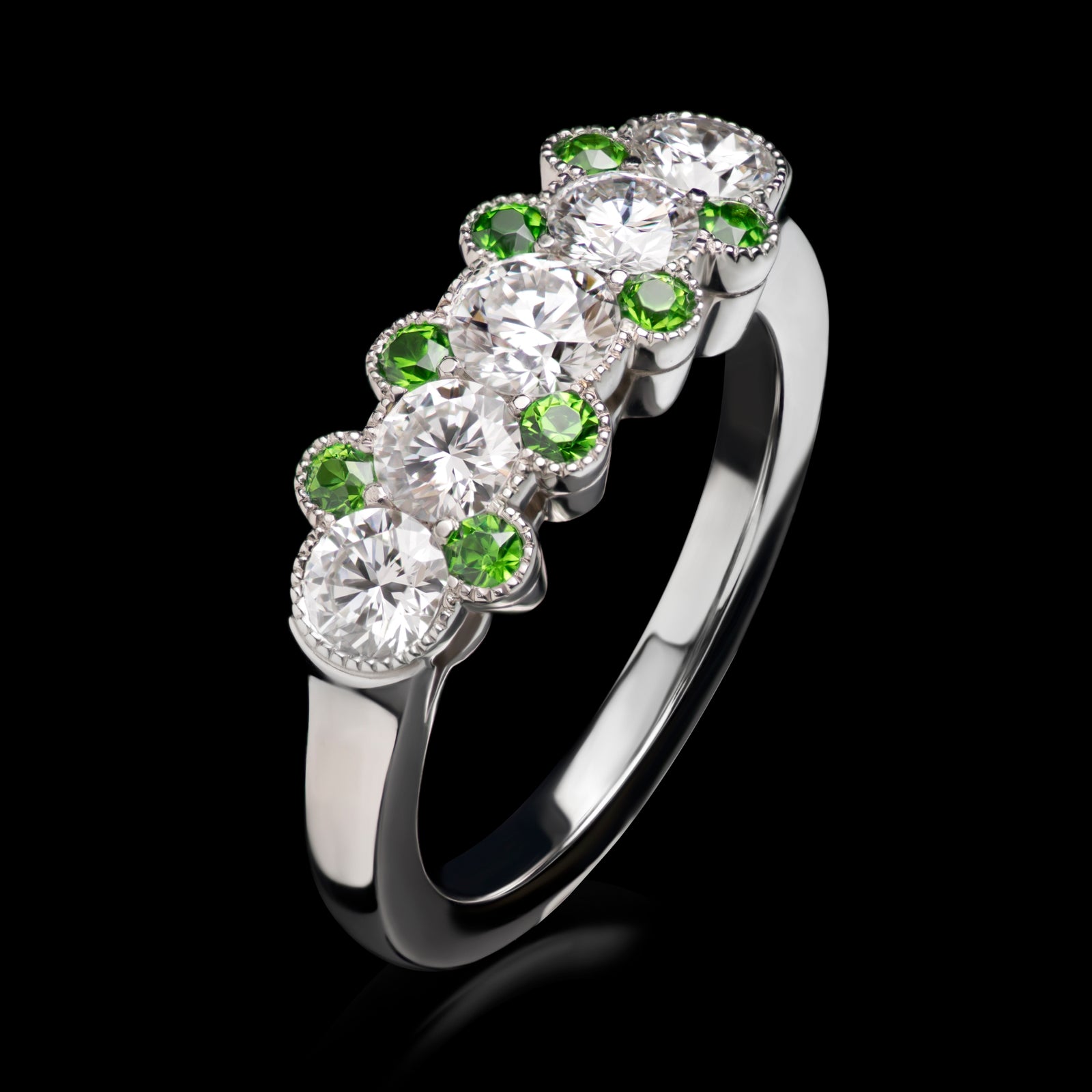 A Cousins Diamond Five Stone Half Hoop Ring with Demantoid Garnet Points