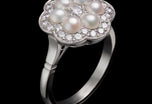 A Natural Half Pearl & Diamond Cluster Ring