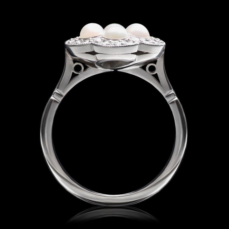 A Natural Half Pearl & Diamond Cluster Ring