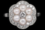 A Natural Half Pearl & Diamond Cluster Ring