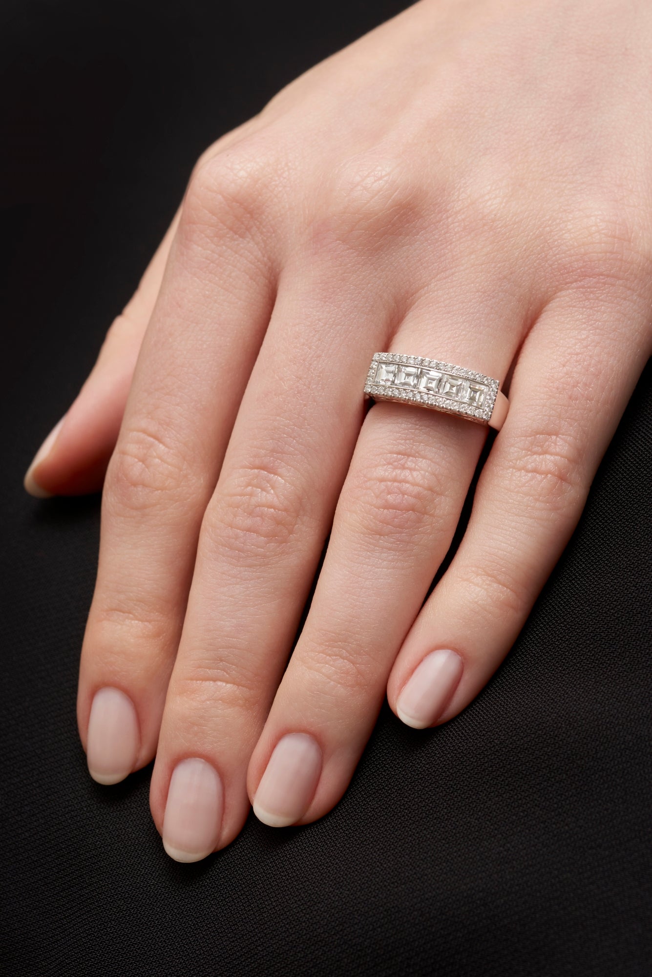 An All Diamond Carree Half Hoop Ring with Diamond Surround