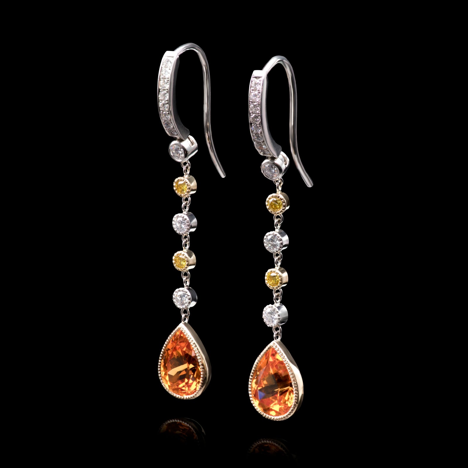 A pair of Rare Mandarin Garnet & White and Yellow Diamond drop earrings.