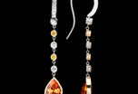 A pair of Rare Mandarin Garnet & White and Yellow Diamond drop earrings.