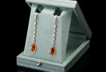 A pair of Rare Mandarin Garnet & White and Yellow Diamond drop earrings.