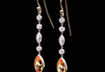 A pair of navette Mandarin Garnet & Diamond Drop Earrings