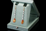 A pair of navette Mandarin Garnet & Diamond Drop Earrings