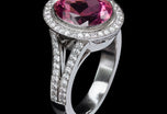 An Oval Pink Tourmaline & Diamond Cluster Ring