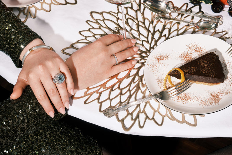 A Cousins ONE IN FIVE. A solid silver & 18 carat yellow gold bangle