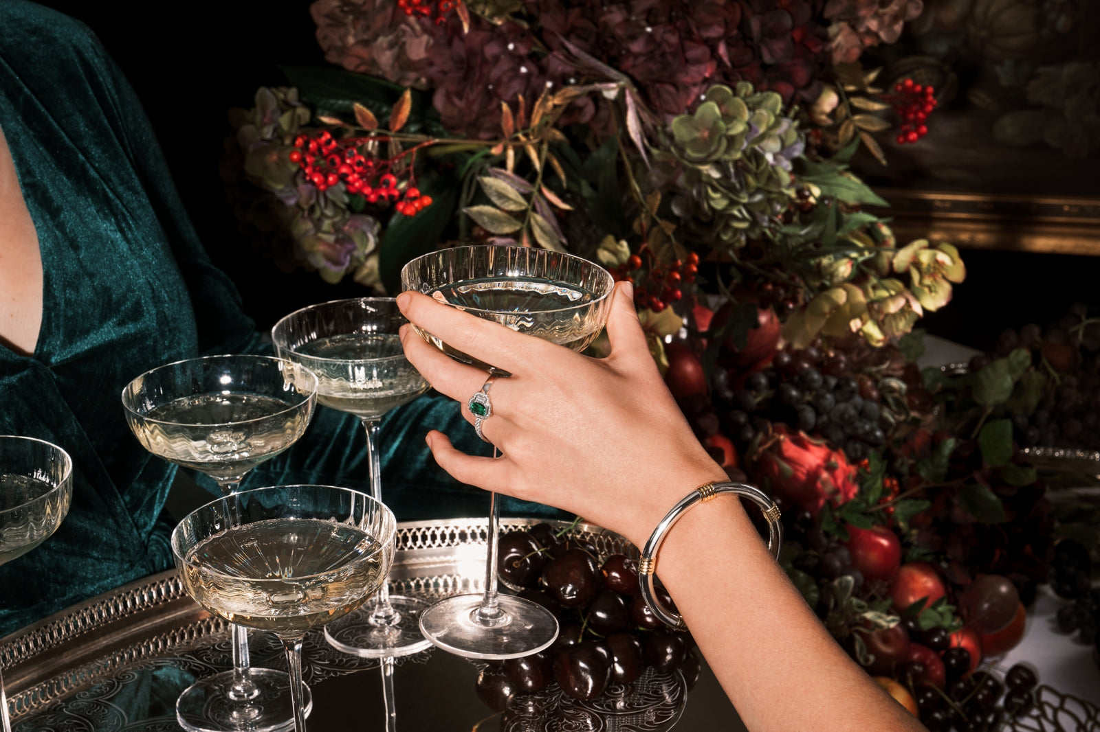 A Cousins ONE IN FIVE. A solid silver & 18 carat yellow gold bangle